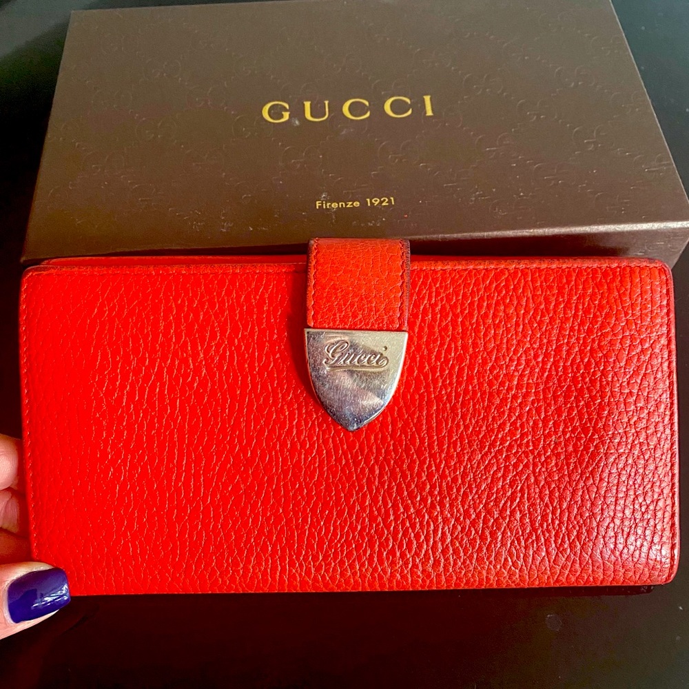 Gucci coral colored large snap closure wallet